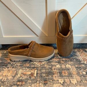 Skechers Easy Going Water Repellent Suede Clogs.